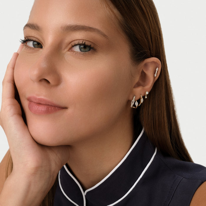 0.14 ctw 14K Gold Round Lab Grown Diamond Two-Stone Stud Earrings, worn on model, view 2