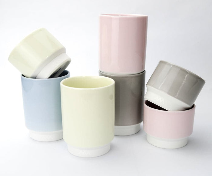Asemi Hasami large cups in light blue shown with other colour variants, highlighting the glazed interiors.
