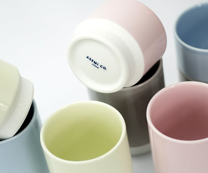 Asemi Hasami small cups showing light pink alongside other colour variants, highlighting the glazed interiors.