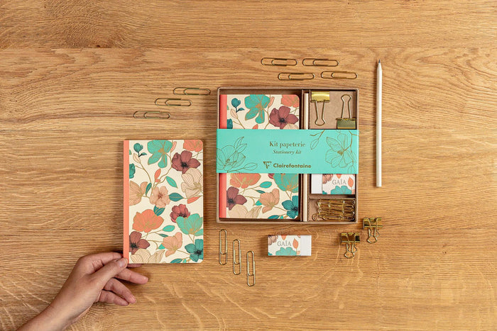 Second desk layout showing Clairefontaine Gaïa Beige stationery set with accessories.
