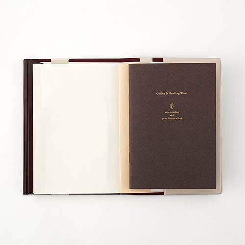Open Daigo Teatime Reading Journal showing blank reading entry pages.