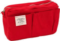 Rear angled view of the red utility pouch highlighting the label and empty outer compartments.