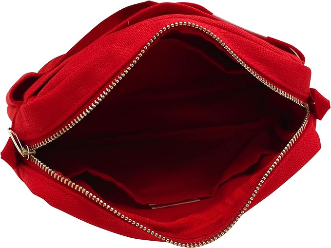 Interior view of the red utility pouch with the zip fully open, showing spacious compartments.