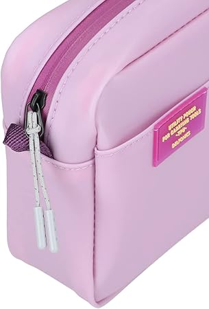 Close-up of the corner of a purple utility pouch, highlighting the zip closure with twin pull cords and the front label.