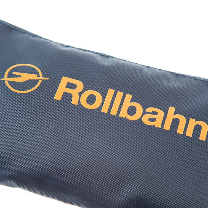 Close-up of the Rollbahn logo in mustard yellow printed on the textured navy nylon pouch.