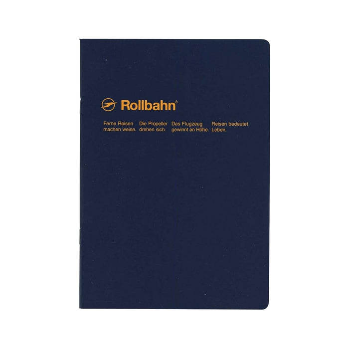 Front cover of a navy blue Rollbahn notebook featuring gold German text and minimalist design.