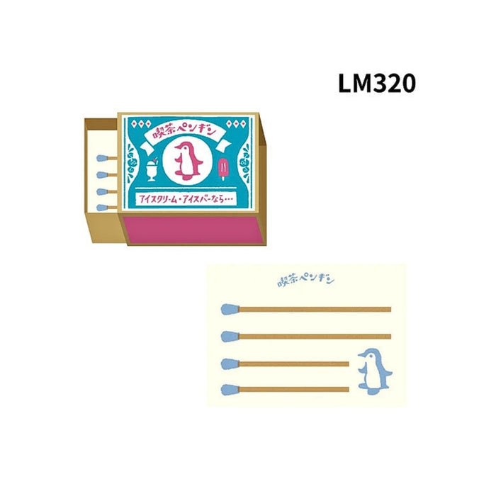 The Journal Shop - Furukawa Shiko Memo Pad Matchbox with a penguin design, paired with matching lined paper.