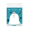 The Journal Shop - Teal blue-packaged sticky notes with a white obake character wearing a red gift tie, displayed on a teal blue background.