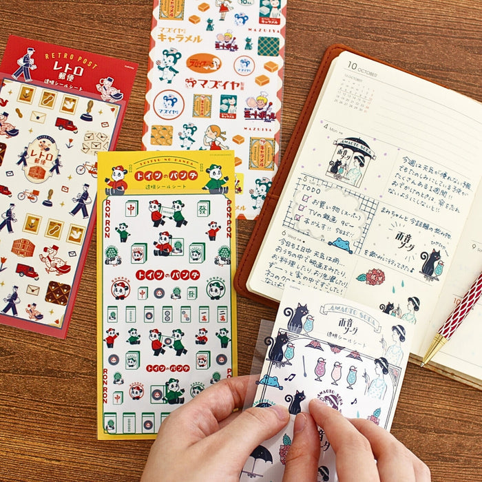 Furukawa Shiko x Ob1 transparent planner sticker sheets being applied to a notebook page.