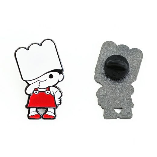 Front and back view of a chef-themed enamel pin featuring a character in red overalls and a large white hat.