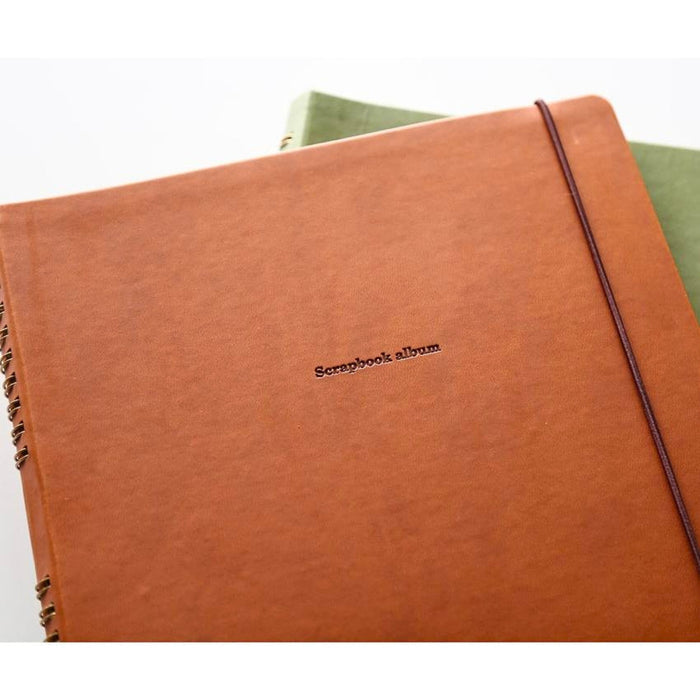 Close-up of Hightide Penco Scrapbook Album khaki ring bound photo album showing textured cover detail.