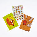 Hobonichi 100%ORANGE Folder Set of 3 for A6 Size (Squirrel’s Moving Day), shown from the front.