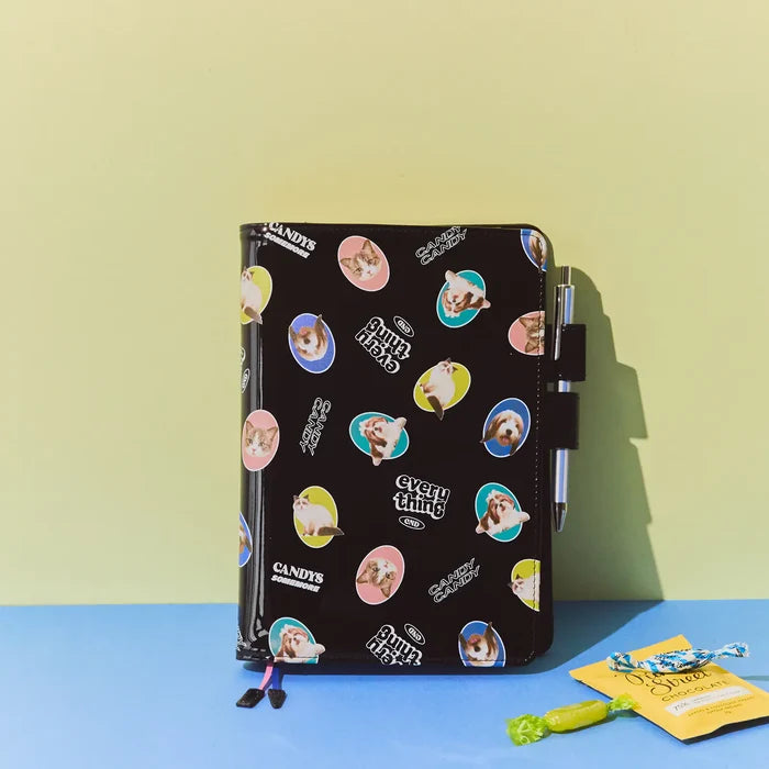 Hobonichi 2026 A5 Cousin Cover: Candy Stripper - Random Dog & Cat (Black), detail view of the design.