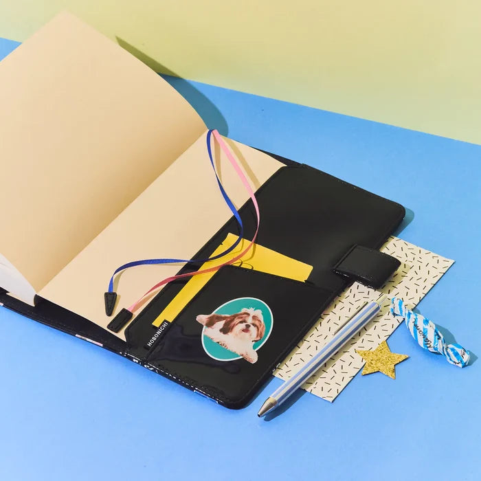 Hobonichi 2026 A5 Cousin Cover: Candy Stripper - Random Dog & Cat (Black), close-up view.