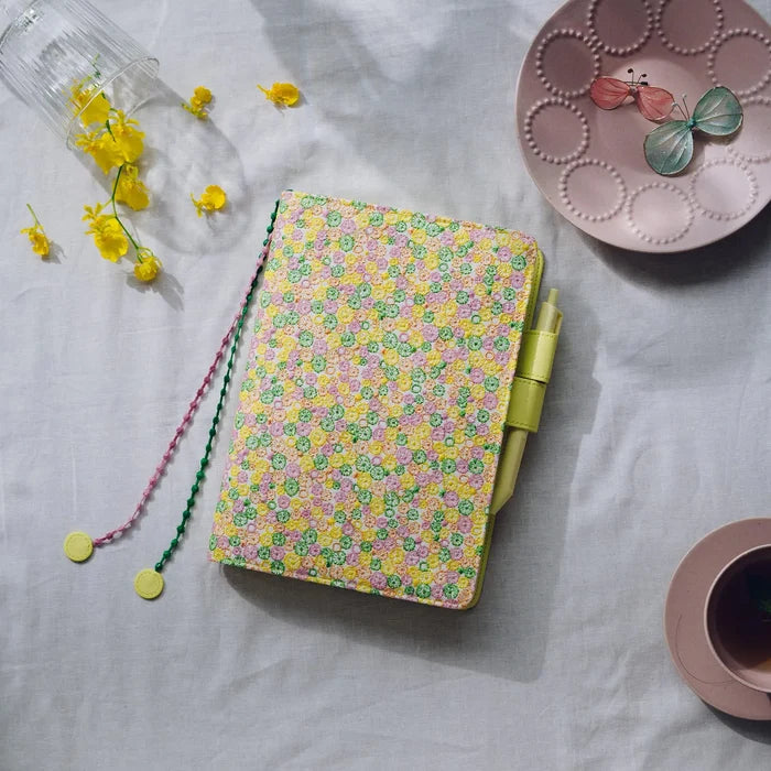 Hobonichi 2026 A5 Cousin Cover: minä perhonen - skyful (Yellow), detail view of the design.
