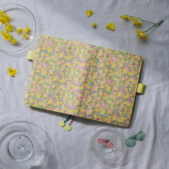 Hobonichi 2026 A5 Cousin Cover: minä perhonen - skyful (Yellow), close-up view.