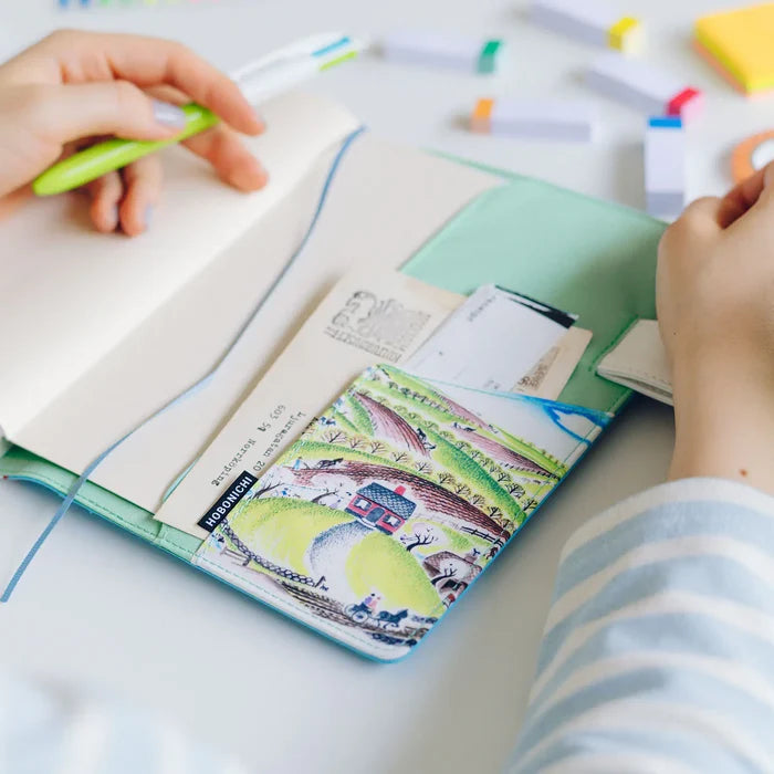 Hobonichi 2026 A5 Cousin Cover: Virginia Lee Burton - The Little House, close-up view.