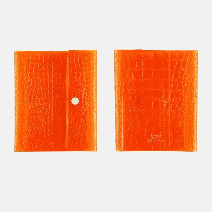 Hobonichi 2026 A6 Planner Cover: beautiful people - Nothing to Hide (Orange), shown from the front.