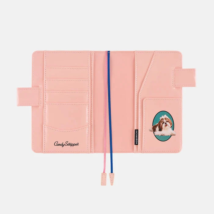 Hobonichi 2026 A6 Planner Cover: Candy Stripper - Random Dog & Cat (Pink), shown with its details.