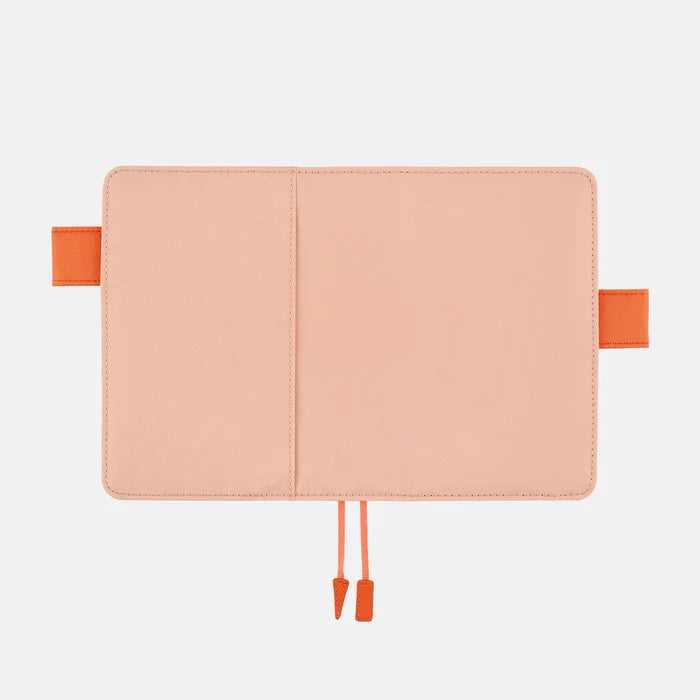 Hobonichi 2026 A6 Planner Cover: Colors - Airy Flamingo, shown from another angle.