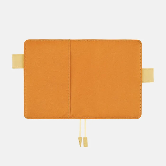 Hobonichi 2026 A6 Planner Cover: Colors - Butterscotch, shown from another angle.