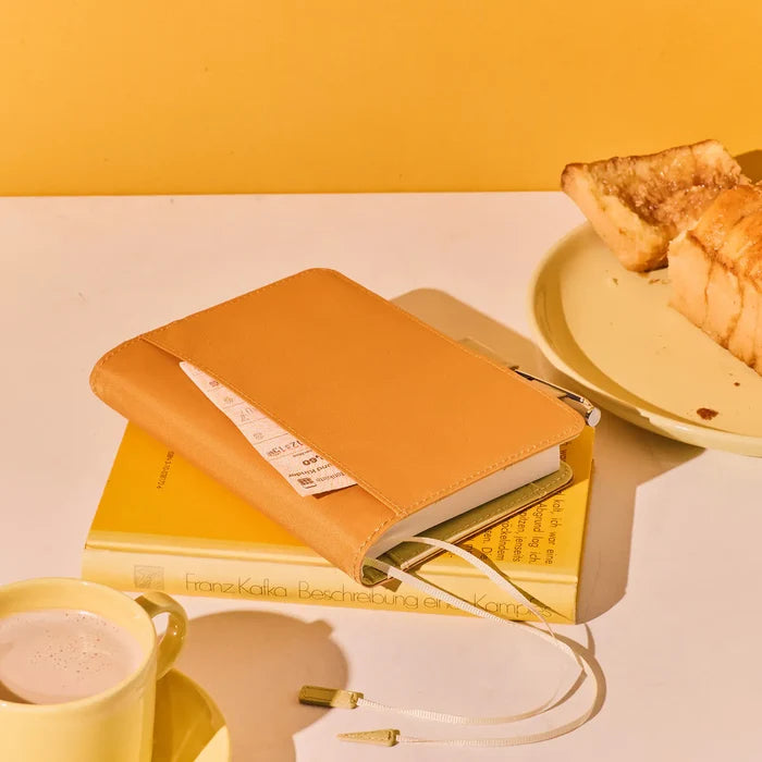 Hobonichi 2026 A6 Planner Cover: Colors - Butterscotch, close-up view.