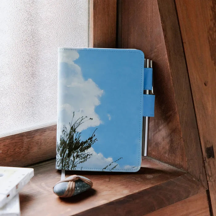 Hobonichi 2026 A6 Planner Cover: Kyohei Sakaguchi - Field Sky, detail view of the design.