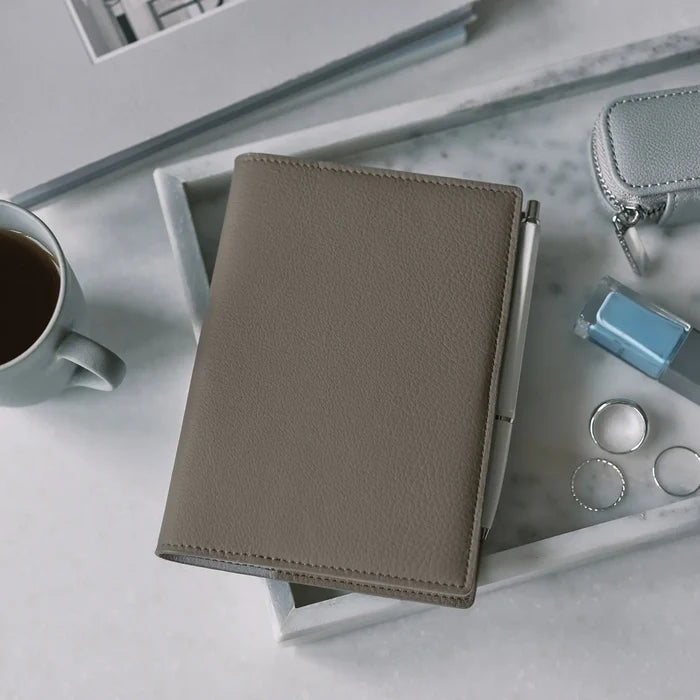Hobonichi 2026 A6 Planner Cover: Leather - Taut (Gray & Light Blue), detail view of the design.