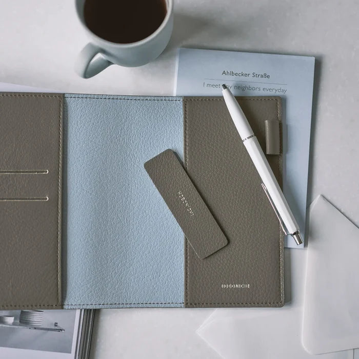 Hobonichi 2026 A6 Planner Cover: Leather - Taut (Gray & Light Blue), shown in full.