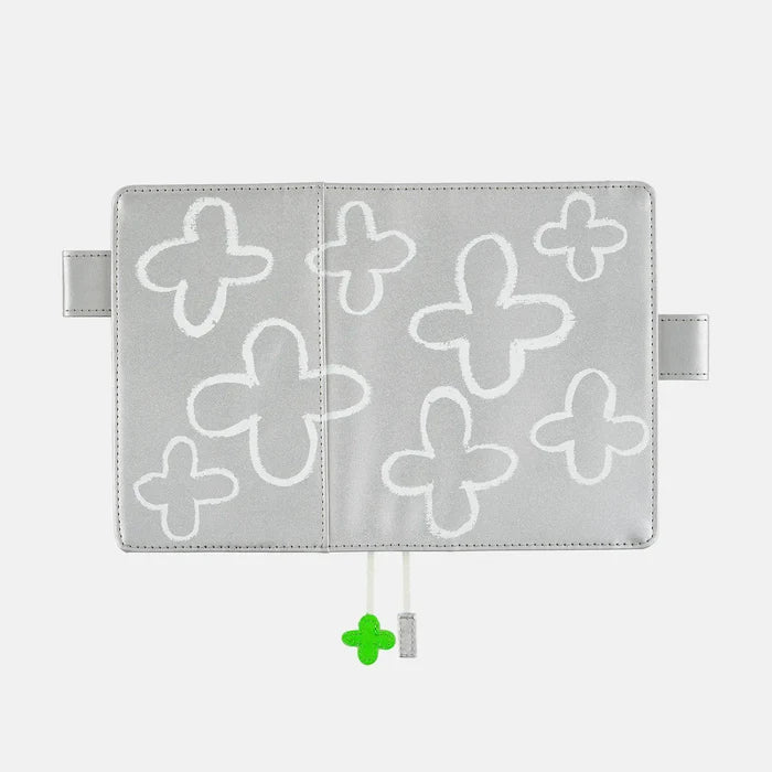 Hobonichi 2026 A6 Planner Cover: Makoto Matsubayashi - Silver Flowers, shown from another angle.