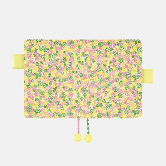 Hobonichi 2026 A6 Planner Cover: minä perhonen - skyful (Yellow), shown from another angle.