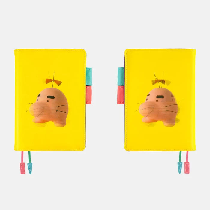 Hobonichi 2026 A6 Planner Cover: MOTHER - Mr. Saturn (It’s Great), shown from the front.