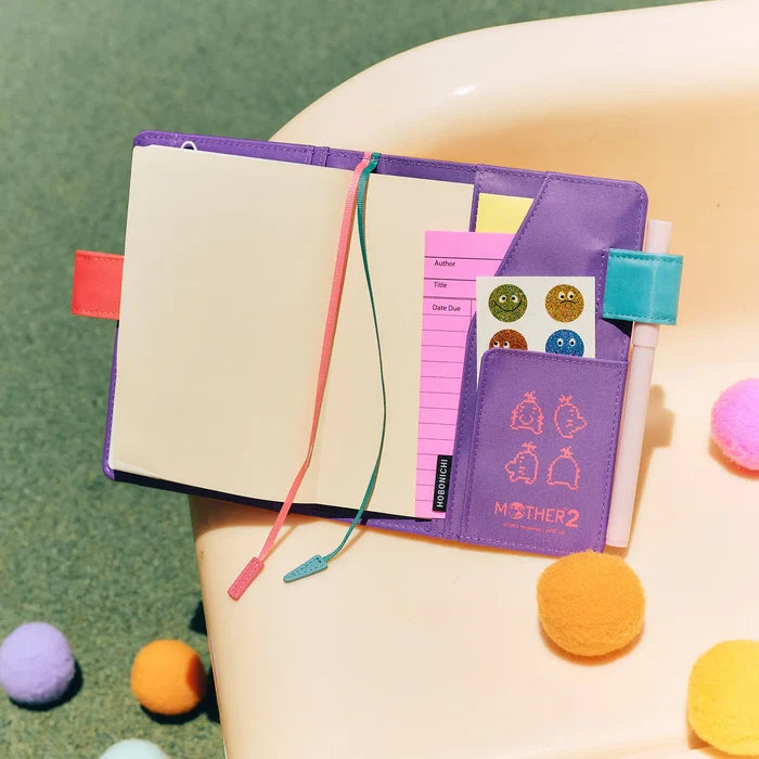 Hobonichi 2026 A6 Planner Cover: MOTHER - Mr. Saturn (It’s Great), close-up view.