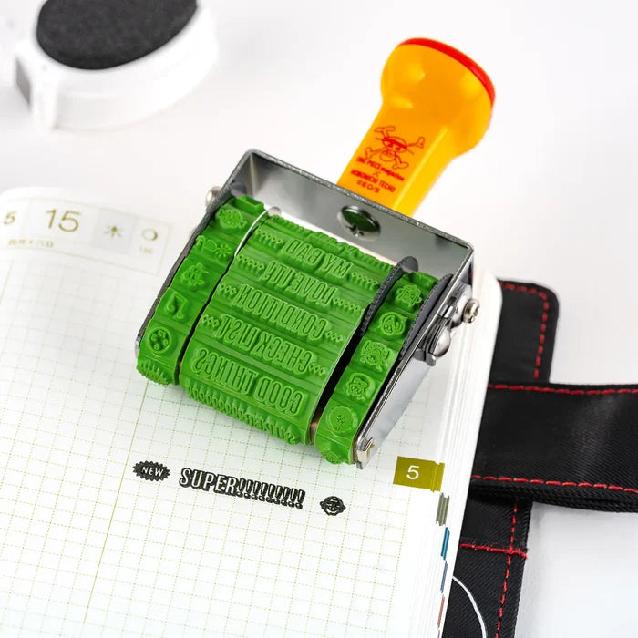 Hobonichi 2026 Accessories: Sanby Rotating Stamp for the Techo (One Piece), shown from the front.