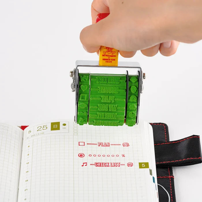 Hobonichi 2026 Accessories: Sanby Rotating Stamp for the Techo (One Piece), shown in full.