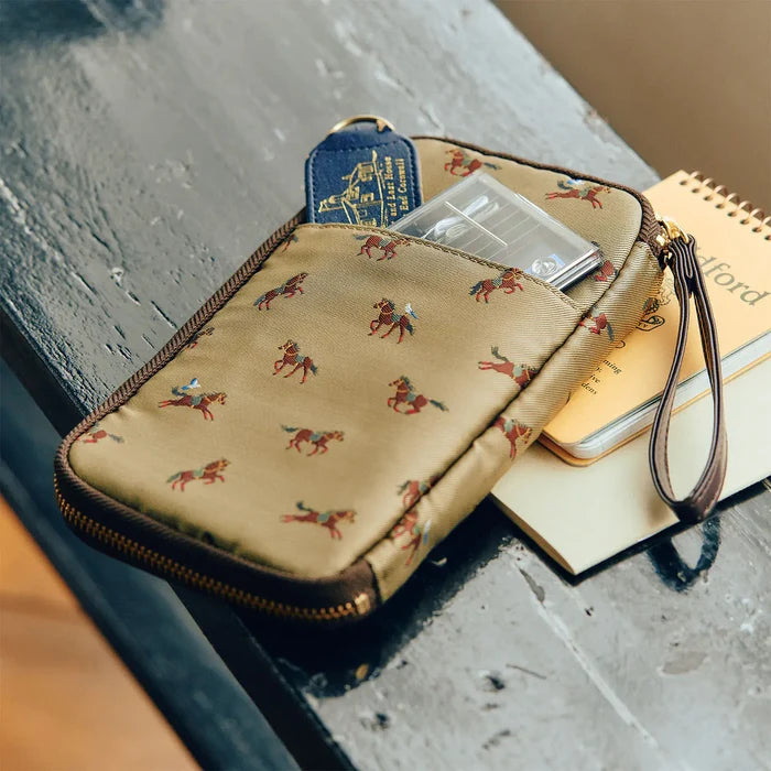 Hobonichi 2026 Accessories: Small Drawer Pouch (Bow & Tie - Galloping Horses), close-up view.