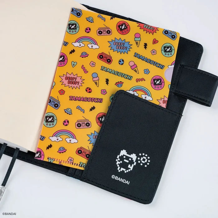 Hobonichi 2026 Accessories: Tamagotchi - Hobonichi Folder Set of 3 for A6 Size (Tamagotchi), detail view of the design.