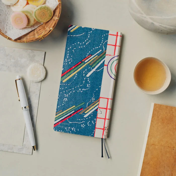 Hobonichi 2026 Spring WEEKS: Unsodo: Bijutsukai (Blue Pigeons) – Japanese/Tall & Slim/Apr Start, shown from another angle.