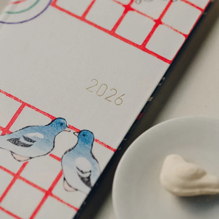 Hobonichi 2026 Spring WEEKS: Unsodo: Bijutsukai (Blue Pigeons) – Japanese/Tall & Slim/Apr Start, detail view of the design.