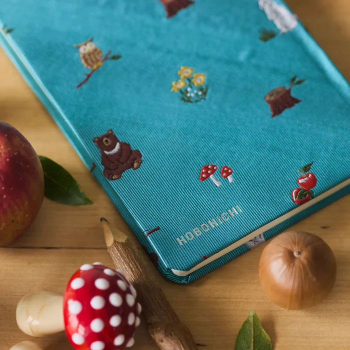 Hobonichi 2026 Weeks: Bow & Tie - In the Forest, close-up view.