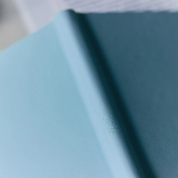 Hobonichi 2026 Weeks: Leather - Snow Blue, close-up view.
