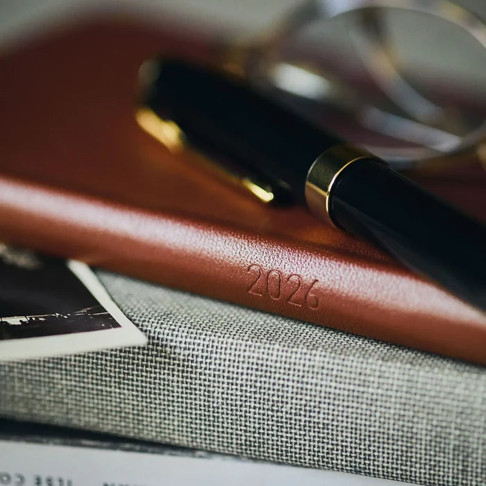 Hobonichi 2026 Weeks: Leather - Wine Brown, detail view of the design.