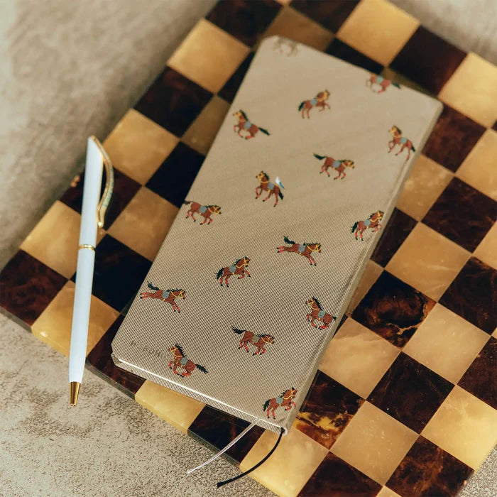 Hobonichi 2026 Weeks Mega: Bow & Tie - Galloping Horses, close-up view.