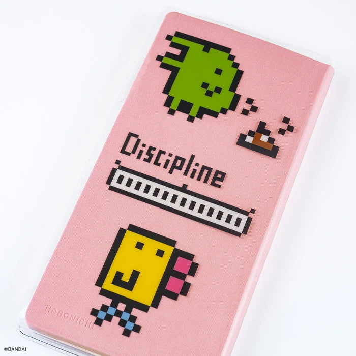 Hobonichi 2026 Weeks Planner Cover: Tamagotchi - Clear Cover for Weeks (Carefree Tamagotchi), shown in full.