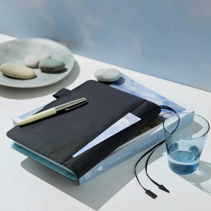 Hobonichi 2026 A5 Cousin Cover: Colors - Black x Clear Blue, close-up view.