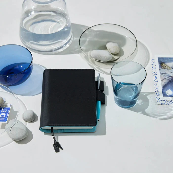 Hobonichi 2026 A6 Planner Cover: Colors - Black x Clear Blue, detail view of the design.