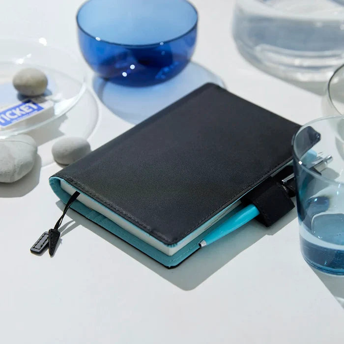 Hobonichi 2026 A6 Planner Cover: Colors - Black x Clear Blue, shown in full.