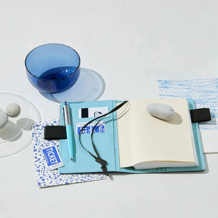 Hobonichi 2026 A6 Planner Cover: Colors - Black x Clear Blue, close-up view.
