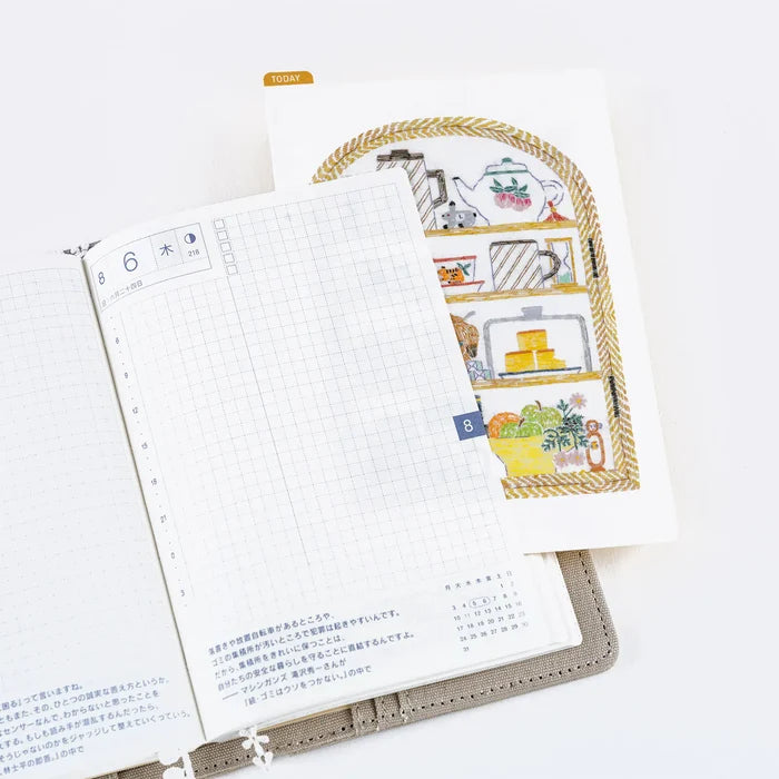 Hobonichi 2026 Accessories: iyo okumi - Hobonichi Pencil Board for A5 Size (Happy Tea Time - Taste Good), close-up view.