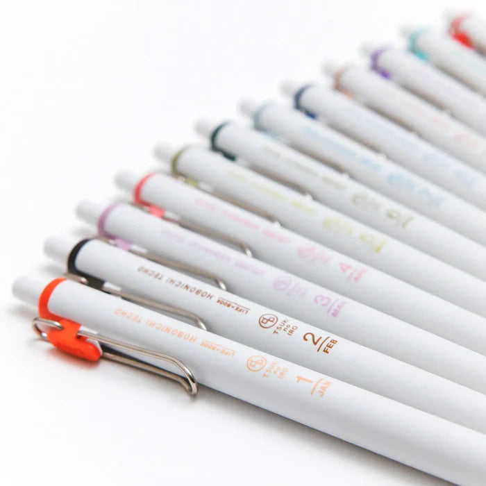 Hobonichi 2026 Accessories: TSUKI no IRO: Uniball One Set of 6 with Case, shown from another angle.